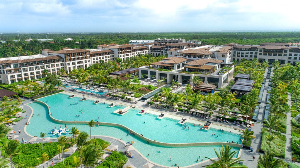 Aerial drone photograph of a resort and pool hotel
