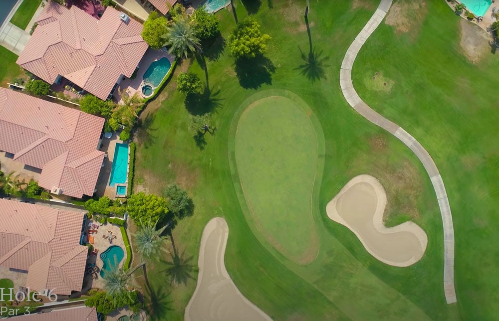 Top down view of a green golf course hole
